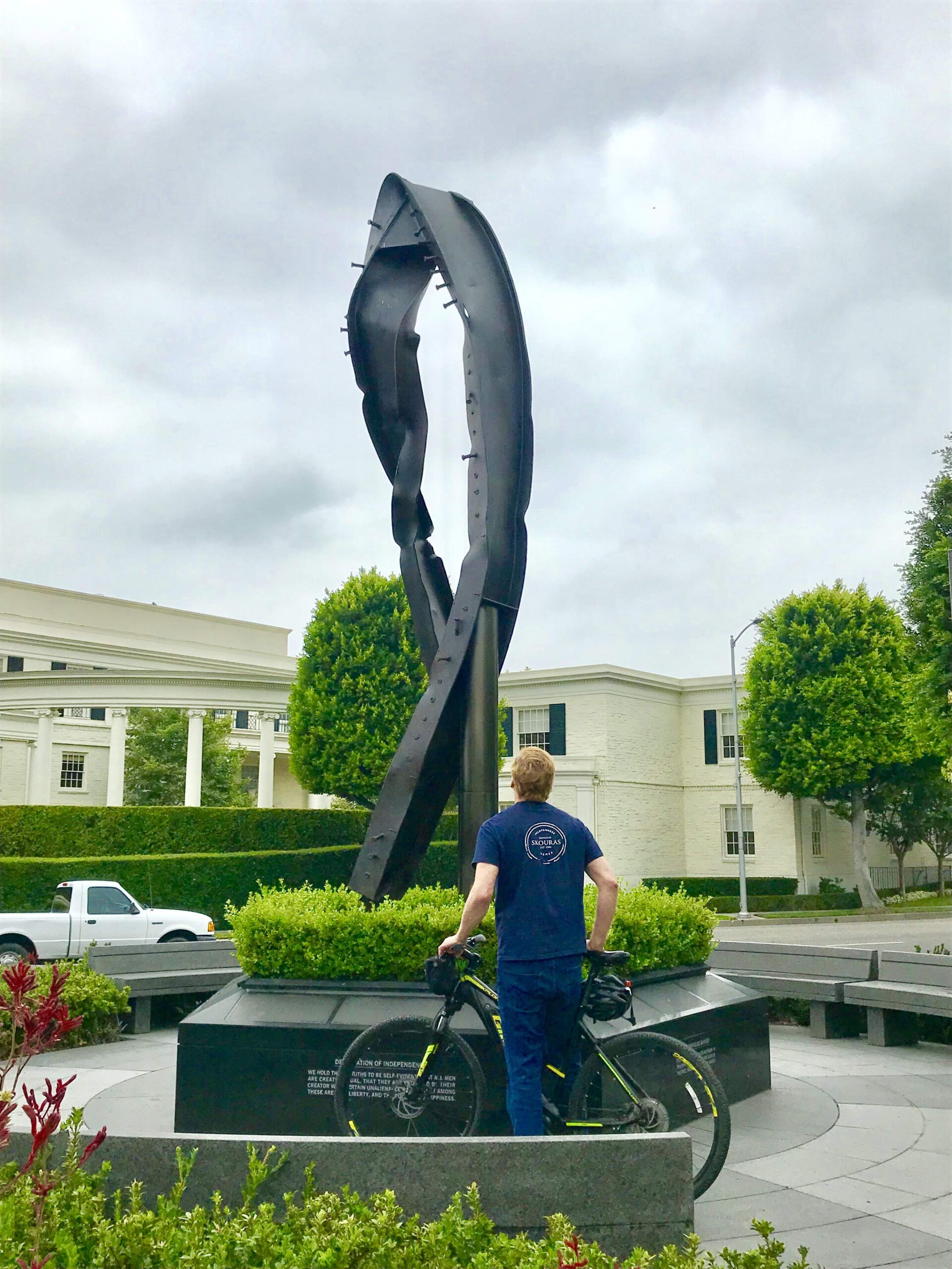 An art sculpture viewed by a guest on the Bevelry Hills Tour