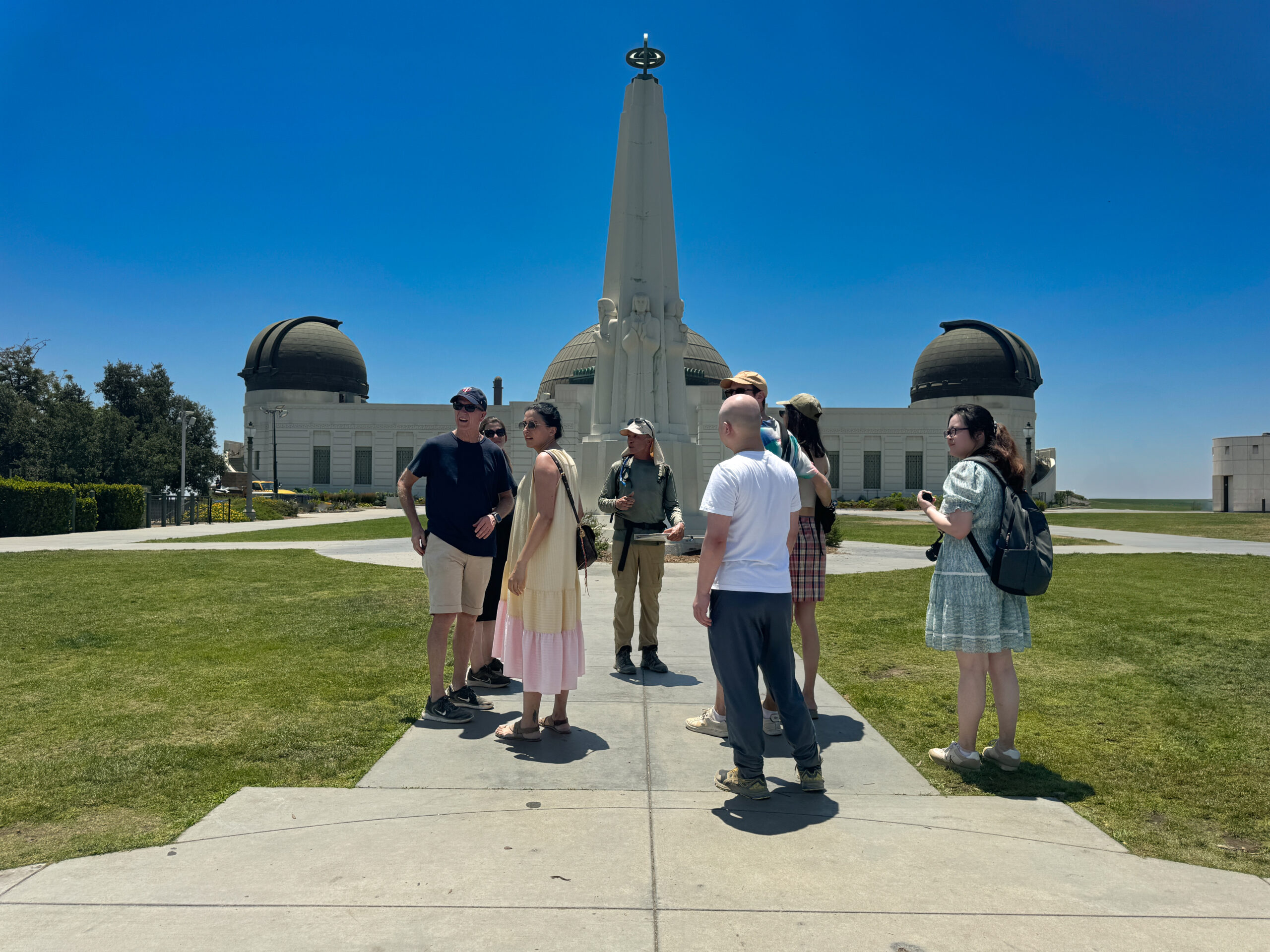 Guests on the best Griffith Observatory Hike standing in front of the building