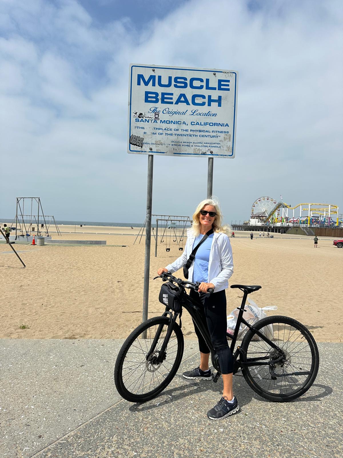 A tour guest at the original Muscle Beach