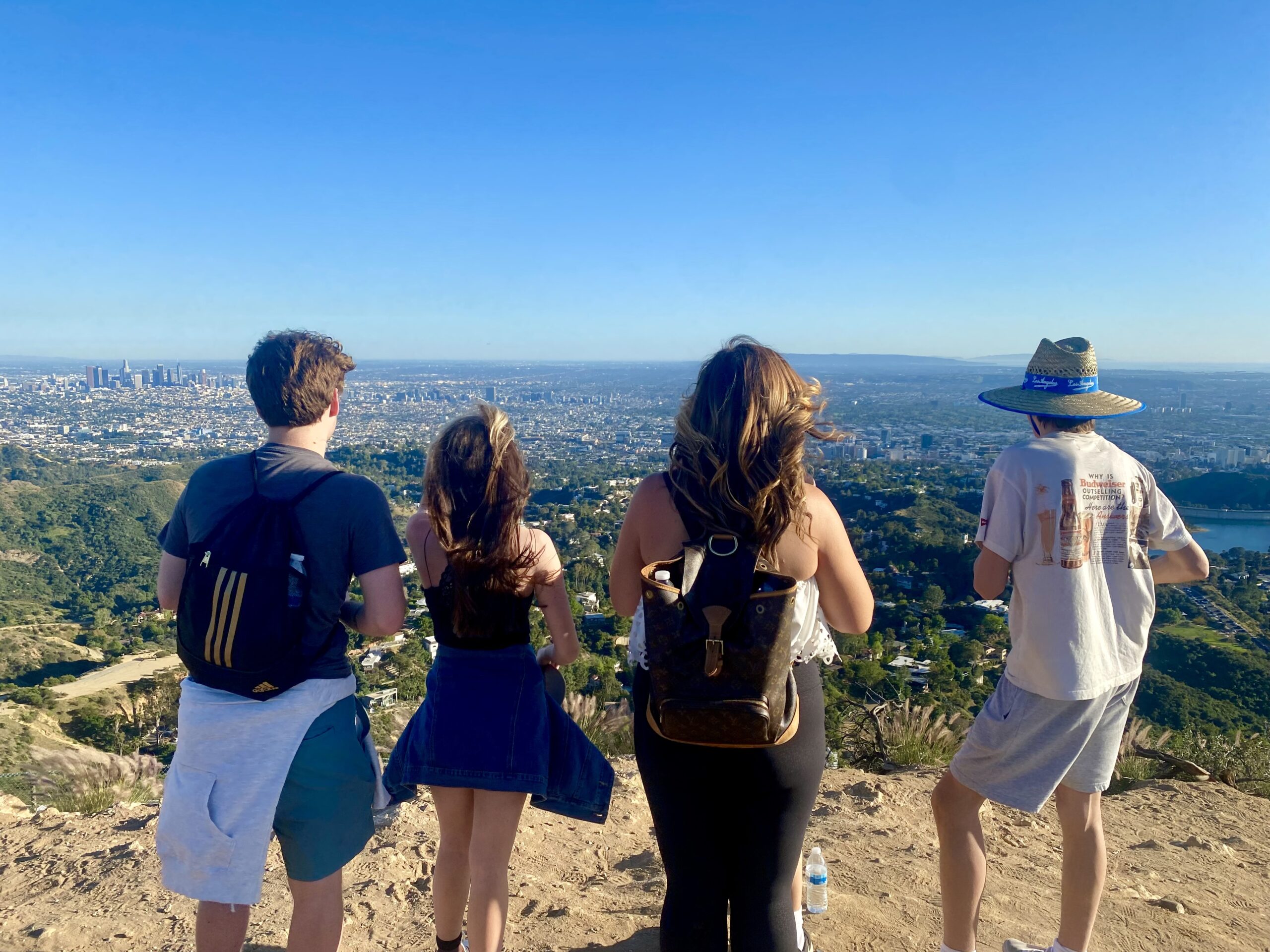 A family takes in the views at the top of the Hollywood Sign Hike