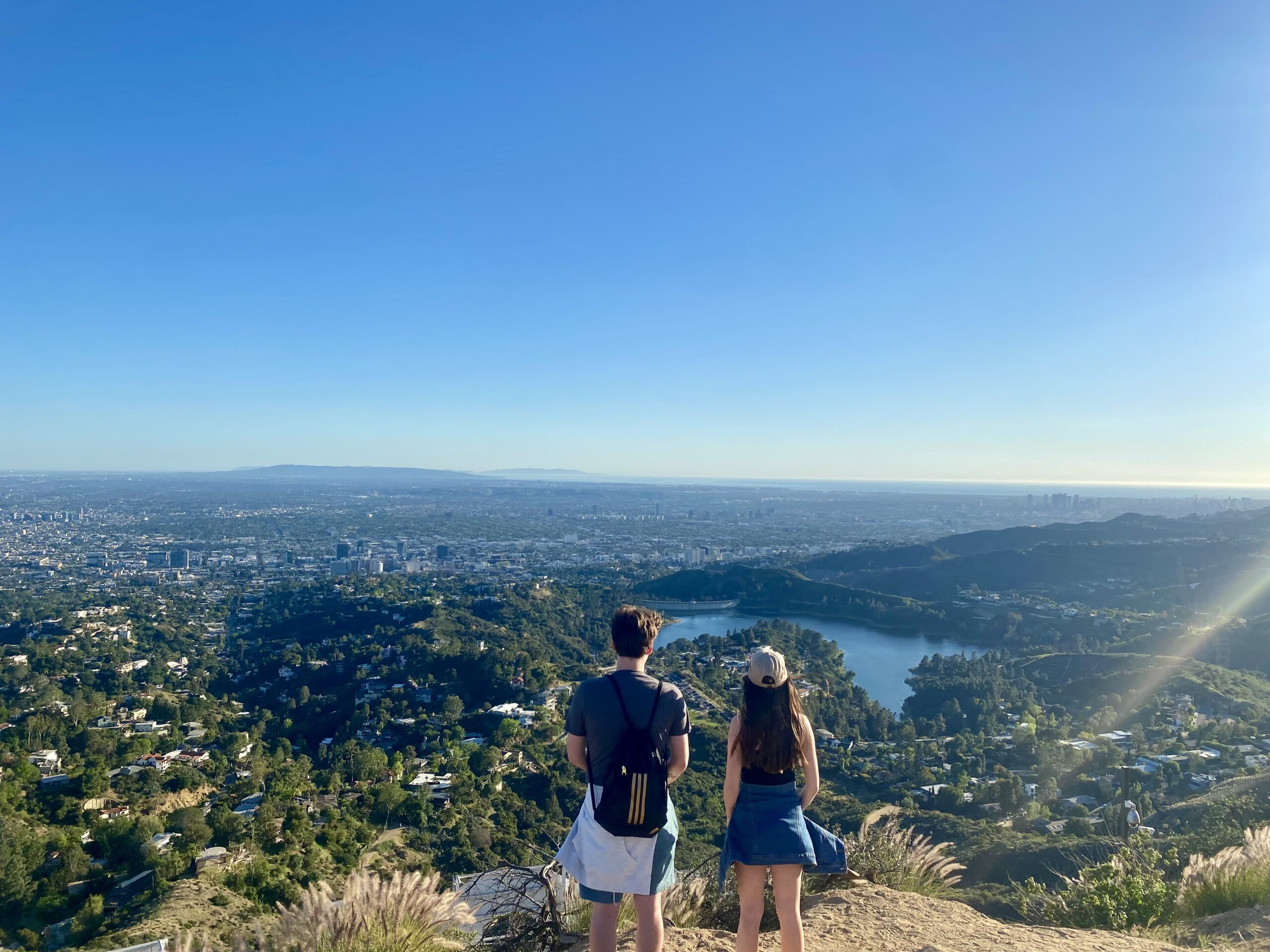 two people look out over the Hollywood Reservoir on the Hollywood Sign Hike